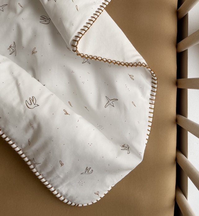 An ideal birth gift for baby's first nights in soft, organic cotton